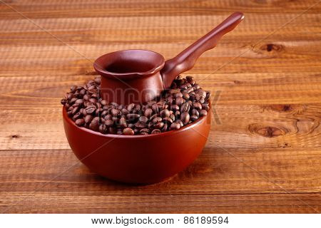 Coffee Beans In Bowl With Finjan