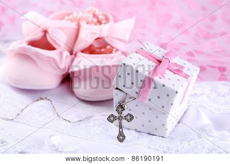 Baby shoe and cross for Christening