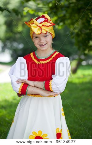 Close up Little girl is dressed in the Russian national dress Ã??Ã?? summer park