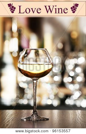 Wineglass on table in bar