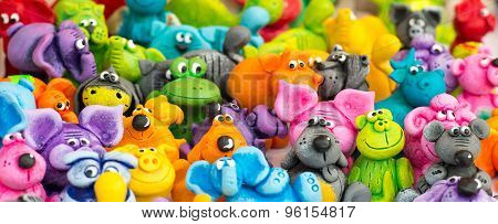 Collection of colorful ceramic figurines.