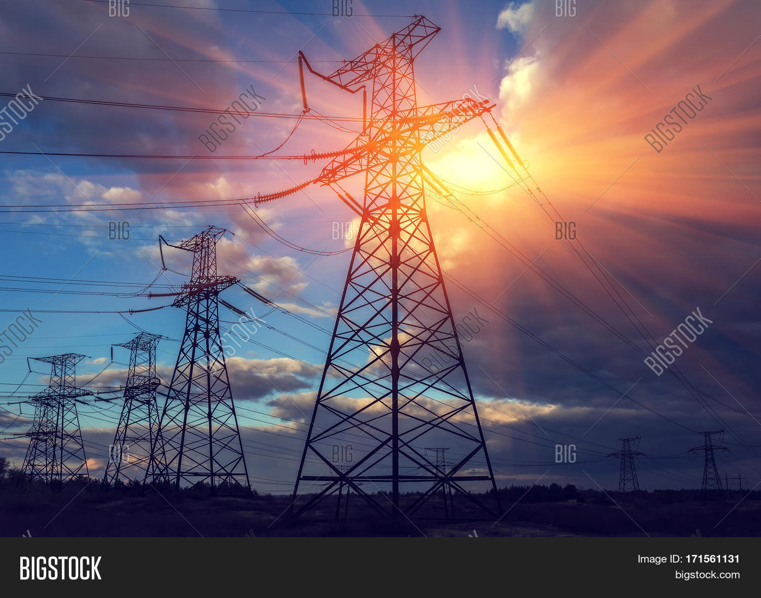 High Voltage Power Image Photo Free Trial Bigstock High voltage power lines that are hung between large metal towers are able to carry electricity over long distances, whereas lower voltage electricity is transmitted through transformers which increase or decrease voltages to adjust to different stages of the journey from the power plant to your home or. high voltage power image photo free