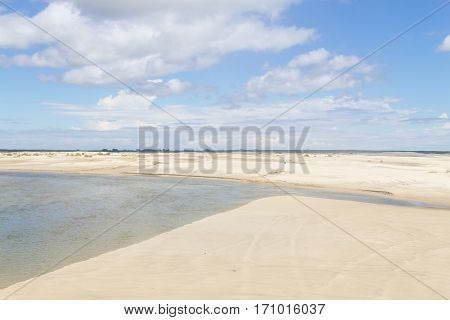 Water Channel And Dunes In The Tavares Beach