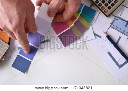 Decorator Showing A Color Tone On Work Table Top View