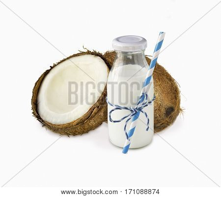 milk of coconut and fresh coconuts isolated on white background. Сoconut with copy space for text.