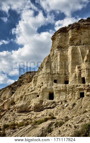 Typical houses in caves in Arguedas, tourist destination in Spain