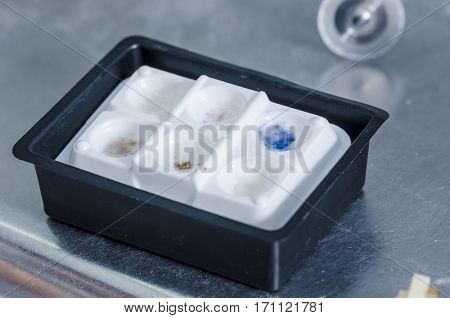 Plastic Recipient Of Ink Of Color To Tinted A Teeth.