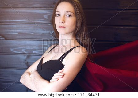 Superwoman Office Worker Standing In A Suit And Red Cloak