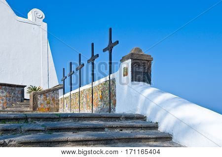Ischia Italy - October 18 2008:  The cross at the entrance of the Del Soccorso church