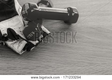 Fitness equipmen on a wooden background. Weight loss and fitness.