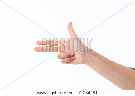 female hand showing with three fingers gesture isolated on white