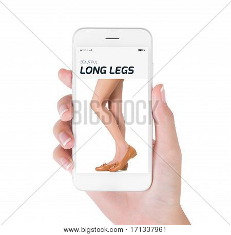 Woman using smart phone searching beautiful long legs posing and wearing a new trendy brown leather shoes fashion of profile view Fashion and accessories concept isolated white background.