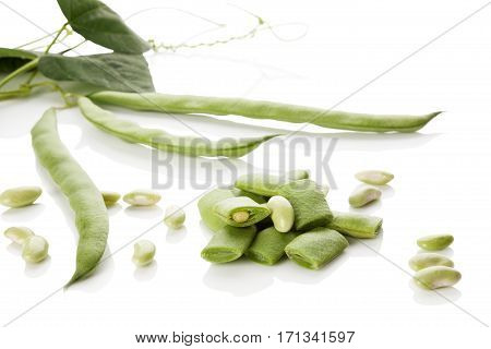 Green sliced beans isolated on white background. Healthy legume eating.