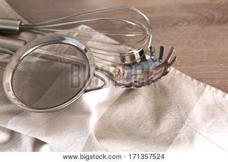 Kitchen utensils on wooden table