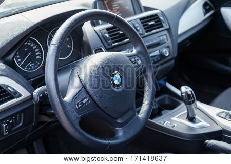 VARNA BULGARIA - MARCH 17 2016: The Interior of BMW Steering Wheel. BMW is a German automobile motorcycle and engine manufacturing company founded in 1916.