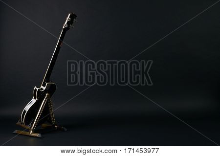 Bass guitar isolated on black background with copy space.Back view