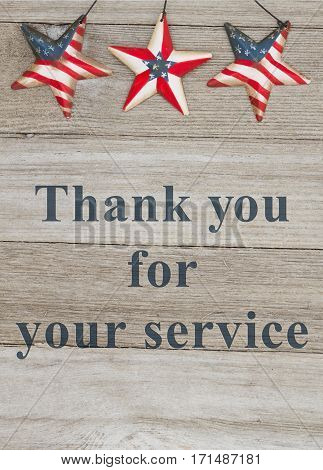 USA patriotic thank you message USA patriotic old flag on a stars with weathered wood background with text Thank you for your service