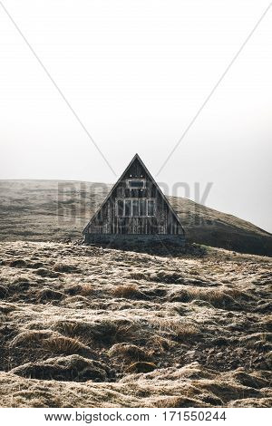 Abandoned cabin beside road in western Iceland.