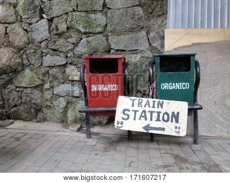 A pair of trash and recycling bins near the train station in Aquas Calientes