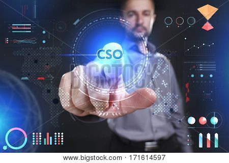 Business, Technology, Internet And Network Concept. Young Businessman Showing A Word In A Virtual Ta