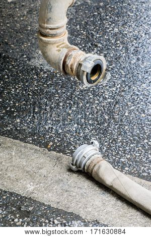 The Fire Hose With Finnish Coupler On Wet Road