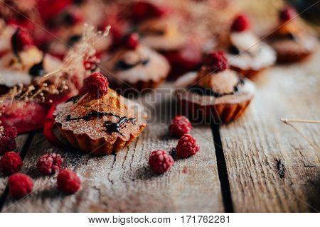 Delicious Chocolate Cupcakes With Berries On Wodeen Table, Top V