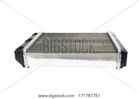 Engine cooling radiator isolated on white background. Auto spare parts for passenger car.