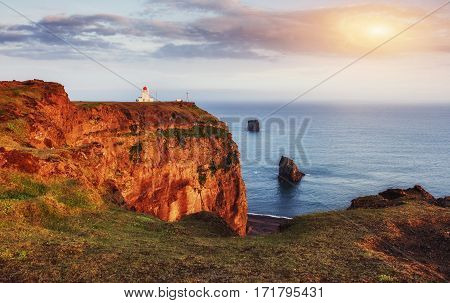 Beautiful white lighthouse at Cape Dyrholaey, South Iceland.