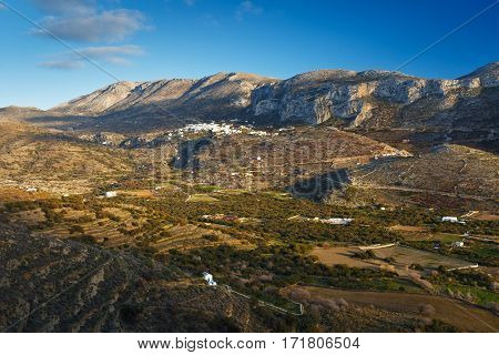 View of the Aegiali village across a valley, Amorgos island.