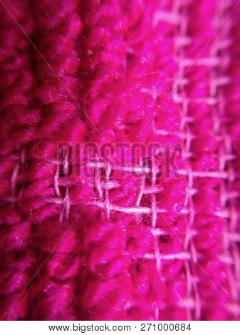 Macro View Of Pink Khitting Wool Background Or Desktop With Knitting Cord