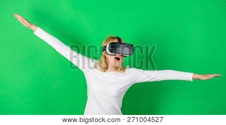 The Woman With Glasses Of Virtual Reality. Confident Young Woman Adjusting Her Virtual Reality Heads