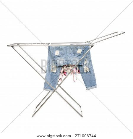 The Clothes Drying Rack With Clen Clothes On White Backgrouns Isolation