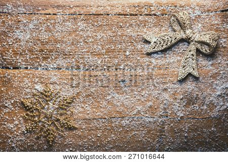bow on froozen wooden wall, christmas background 