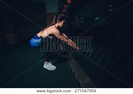 Sport, Fitness, Weightlifting And Training Concept Group Of People With Kettlebells And Heart-rate T