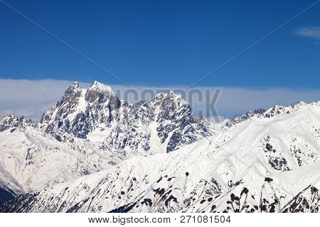 Snowy Mountains And Blue Sky With Clouds At Sunny Winter Day. Caucasus Mountains. Svaneti Region Of 