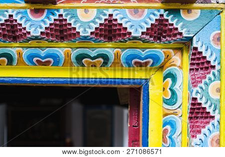 Marpha, Nepal - May 2015: Detail Of Wood Carving Ornament On Nepalese Buddhist Monastery Entrance Do