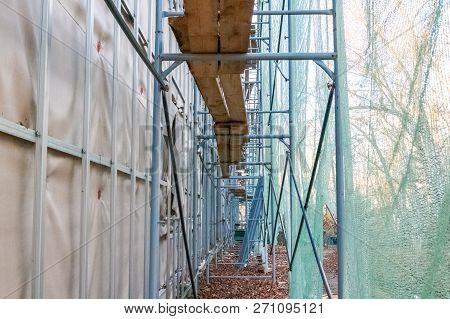 Construction Site Restoration Work On The Renovation Of The Old Facade Of The Building