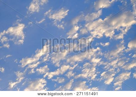 A Beautiful Wavy Clouds Against Blue Sky In Bright Day For Background Texture