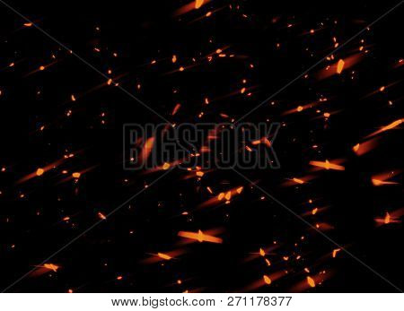 Fire Sparks Came From Campfire Isolated On Textire Black Background For Overlay Design Or Screen Ble