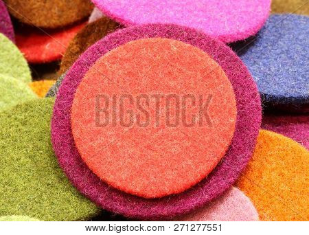 Circles Of Which One Is Red As A Background Made With Boiled Wool Material