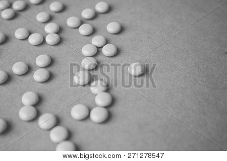 Little Beautiful Medical Pharmaceptic Round Pills, Vitamins, Drugs, Antibiotics On A Black And White