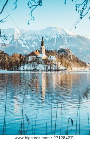Beautiful View Of Famous Bled Island (blejski Otok) At Scenic Lake Bled With Bled Castle (blejski Gr