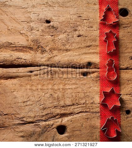 Christmas Wooden Background With Christmas Nuts Sortiment.