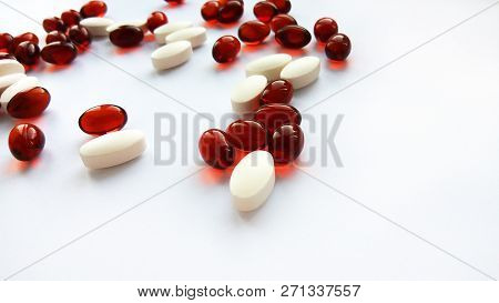 Assorted Colorful Pharmaceutical Medicine Pills, Tablets And Capsules On White Background. Pharmacy 
