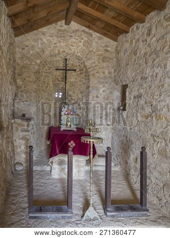 Greece, Corfu, Paleokastritsa, September 26, 2018: Interior Of Small Stone Medieval Chapel With Wood