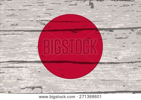 Japanes Rising Sun Flag On Driftwood Timber Background With A White Paint Overlay