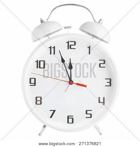 White Alarm Clock Showing Twelve Oclock Isolated On White Background