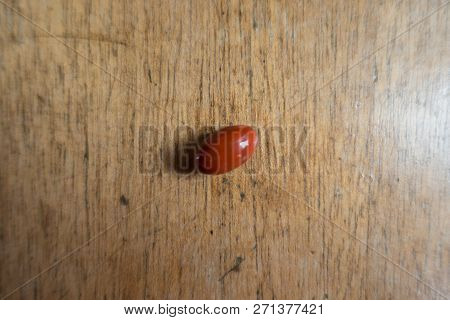View Of Lutein Capsule On Wood From Above