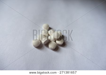 Pile Of Small White Vitamin K Tablets