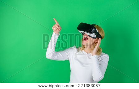 A Person In Virtual Glasses Flies In Room Space. Excited Smiling Businesswoman Wearing Virtual Reali